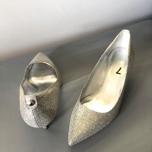 Michael Kors silver/gold (depends on the lighting) heels size 7.